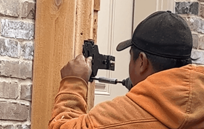 cedar fence gate hardware install closeup